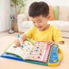 Child playing with interactive phonics learning book sound enabled educational toy in Pakistan