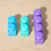 Large plastic blocks size comparison blue and purple in Pakistan