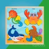 Wooden sea animals puzzle with seahorse crab shark and turtle pieces for toddler learning in Pakistan